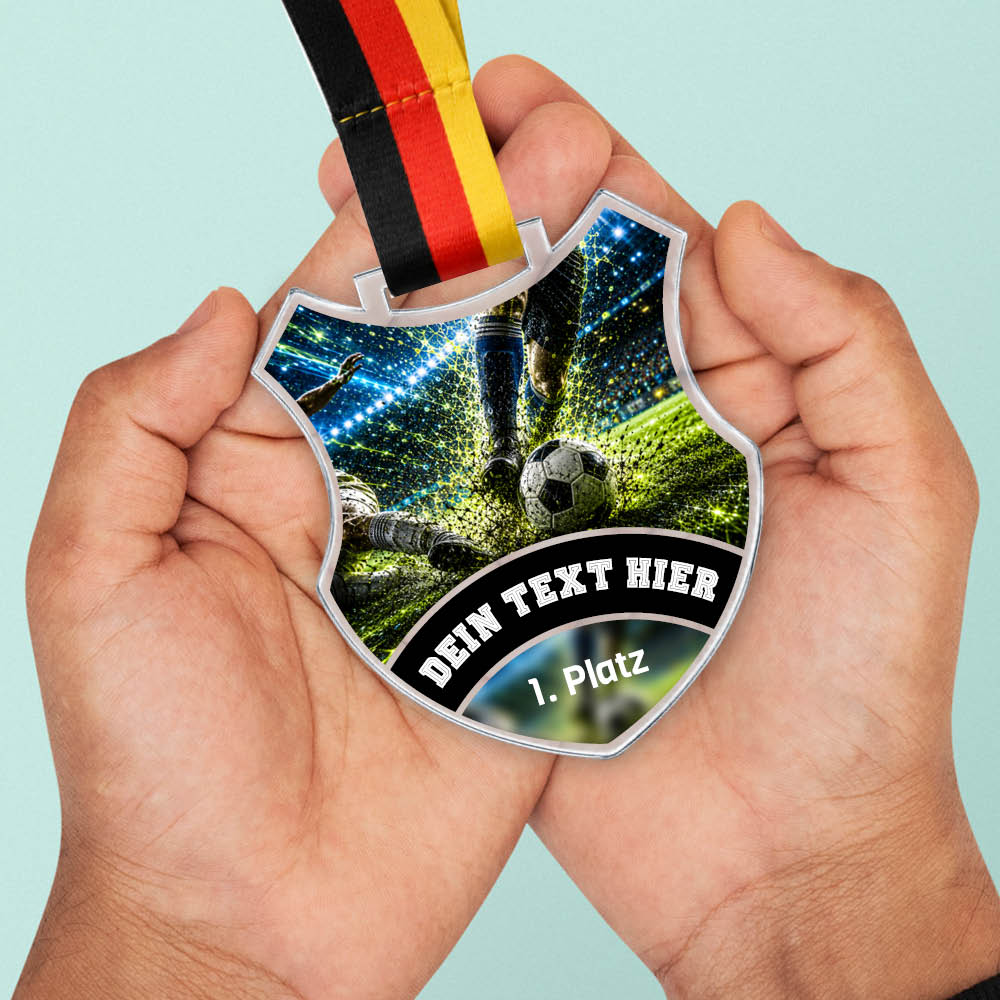 Wappen Medaille Bester Spieler in Händen als Größenvergleich